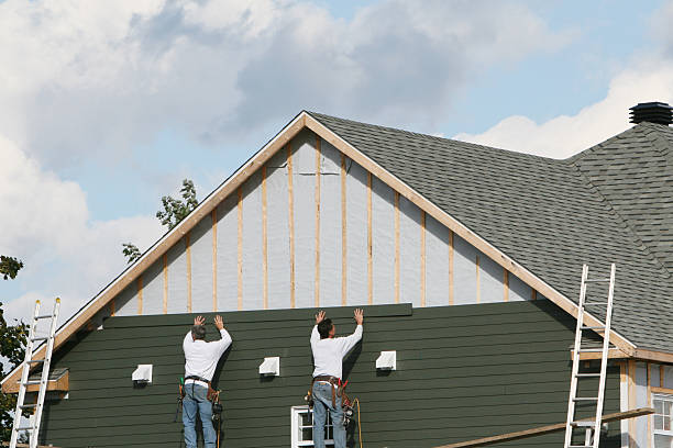Professional Siding Contractor technician working in Oakdale, NY